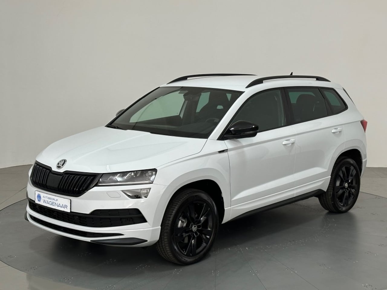 Skoda Karoq - 1.5 TSI SPORTLINE ACC CAMERA TREKHAAK - AutoWereld.nl