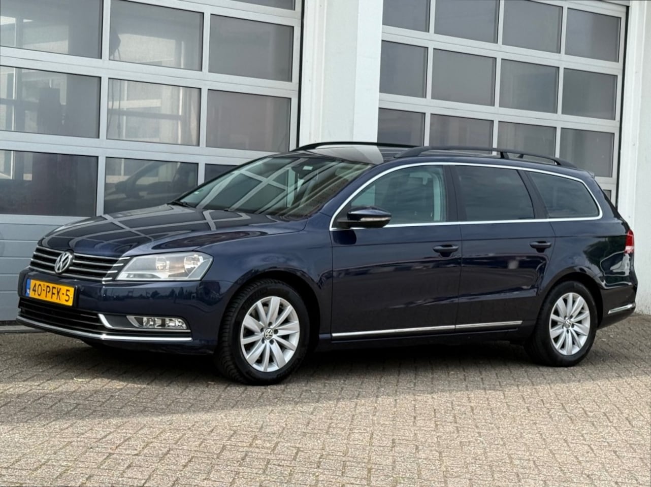Volkswagen Passat - 1.4 TSI 122PK Comfortline Aut. Navi Cruise Leer Trekhaak - AutoWereld.nl