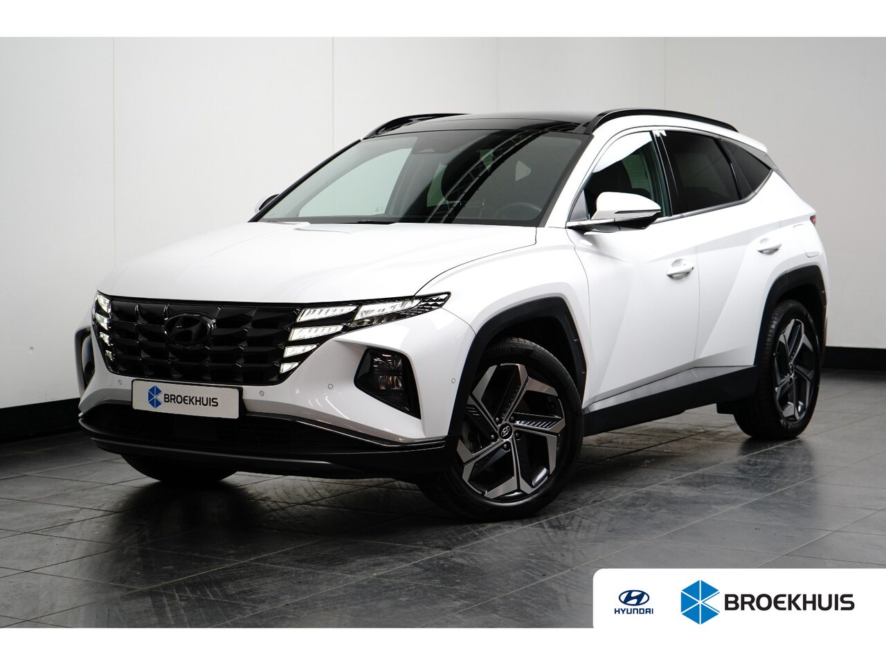 Hyundai Tucson - 1.6 T-GDI PHEV Premium Sky 4WD | Achterbank verwarmd | Airco (automatisch) | Airco separaa - AutoWereld.nl