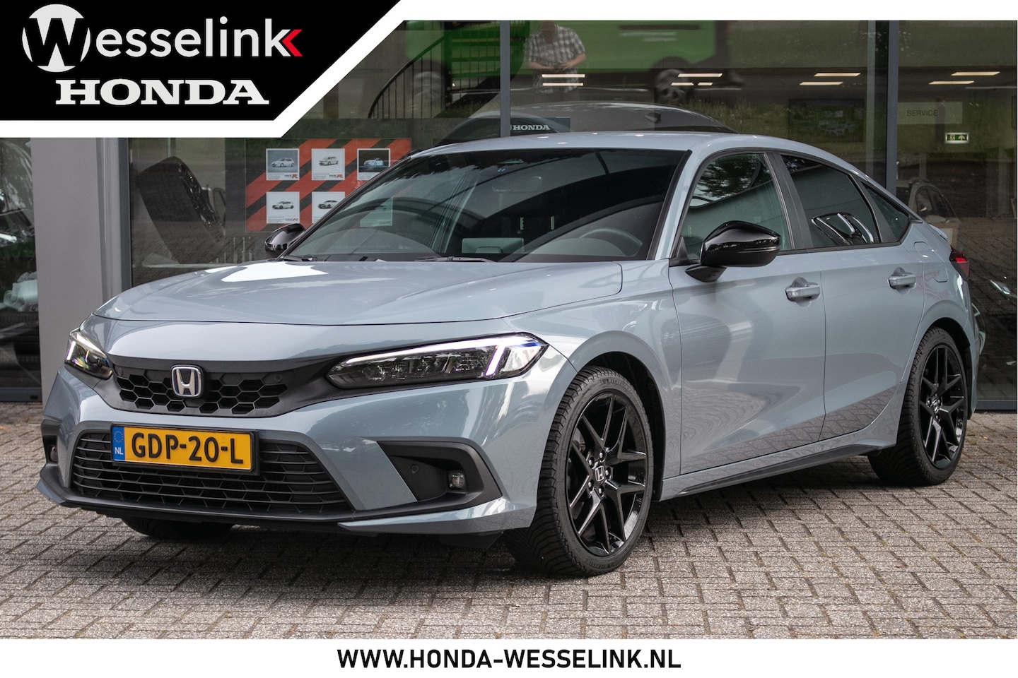 Honda Civic - 2.0 e:HEV Sport - Navi | Camera | Ducktail spoiler - AutoWereld.nl
