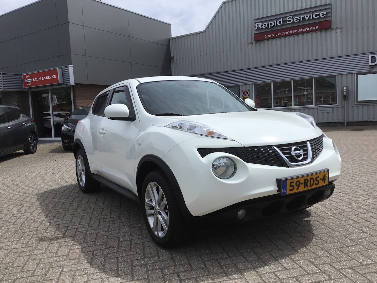 Nissan Juke - 1.6i 16v Acenta Airco,Navi - AutoWereld.nl