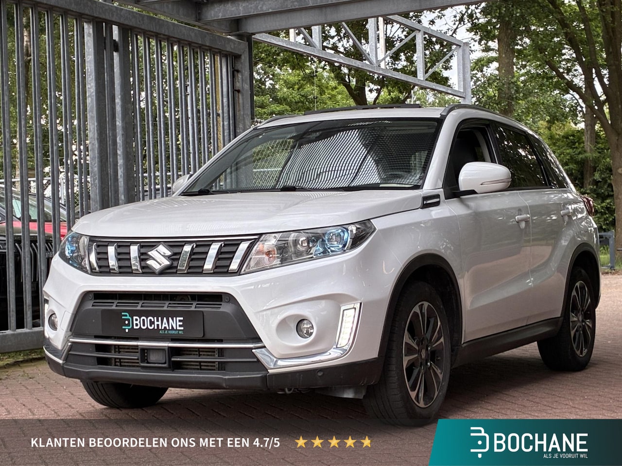 Suzuki Vitara - 1.4 Boosterjet Stijl Automaat 140PK | Half-leder | Schuifkanteldak | Adaptieve Cruise Cont - AutoWereld.nl