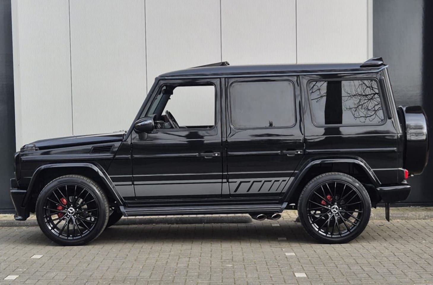 Mercedes-Benz G-klasse - / G55 / AMG BODY / GROOT ONDERHOUD - RIJKLAAR !! / All-BLACK / Alcantara Hemel / Trekhaak - AutoWereld.nl