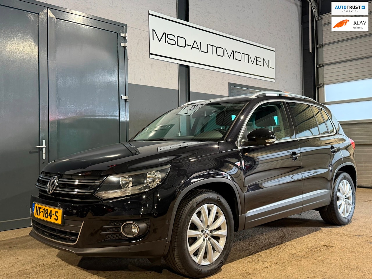 Volkswagen Tiguan - 1.4 TSI Sport&Style|NL AUTO|TREKHAAK|PDC !! - AutoWereld.nl