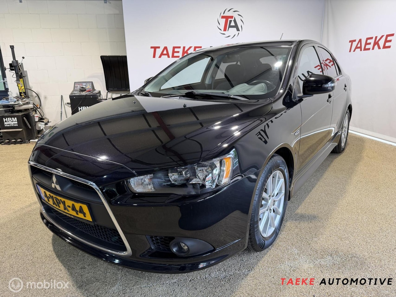Mitsubishi Lancer Sportback - 1.6 Limited Edition Clima/Nap - AutoWereld.nl