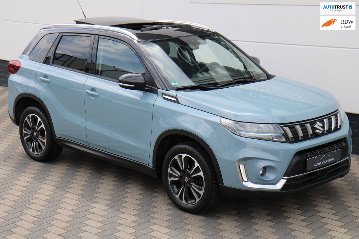 Suzuki Vitara - 1.4 Boosterjet Style Smart Hybrid AllGrip 1.4 Boosterjet Style Smart Hybrid AllGrip Pano - AutoWereld.nl