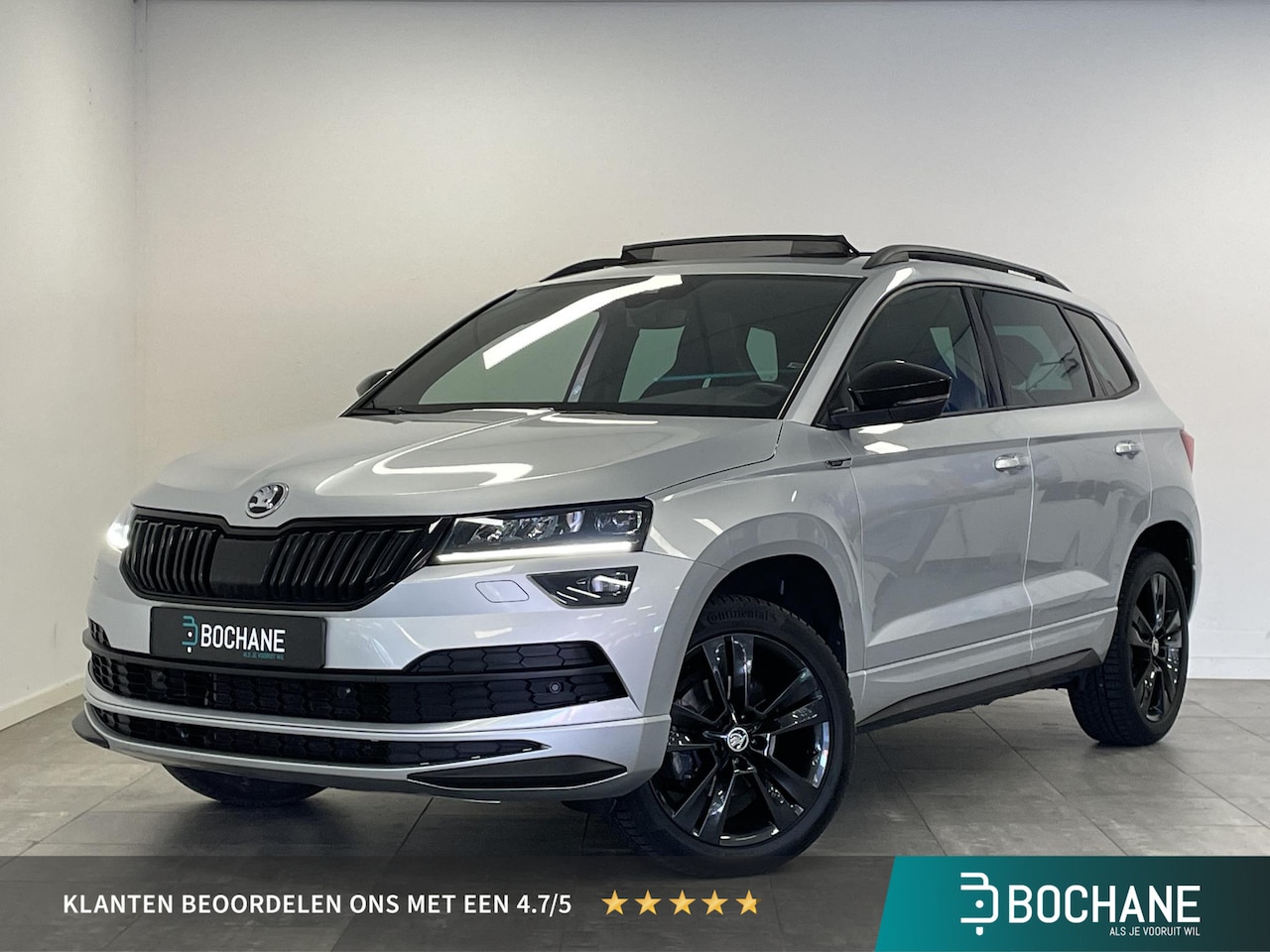 Skoda Karoq - 1.5 TSI ACT Sportline Business NL-auto | 1e Eig. | Winterpakket | Panoramadak | El. Achter - AutoWereld.nl