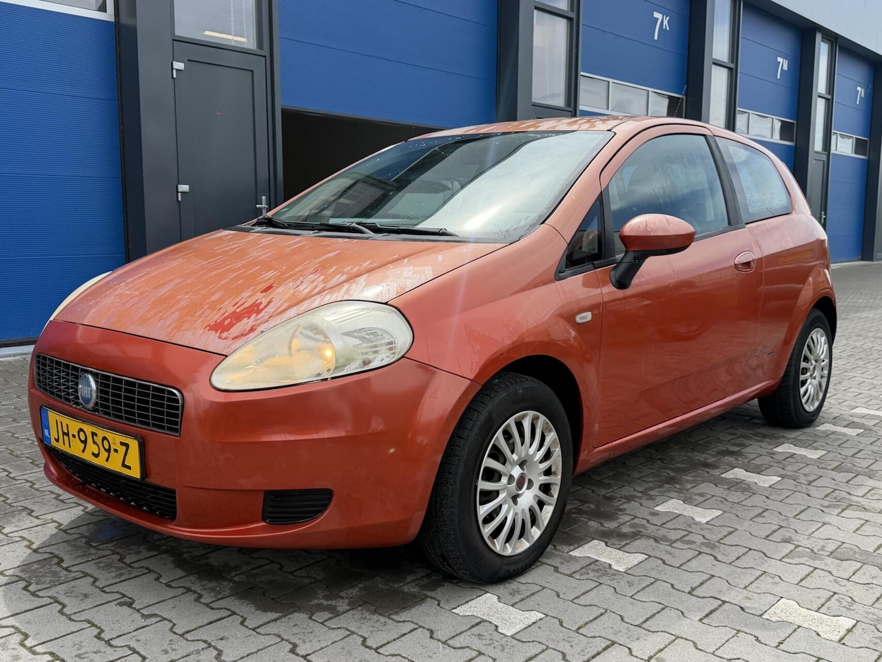 Fiat Grande Punto - 1.2 Sportsound - Airco - Lelijk ding - AutoWereld.nl