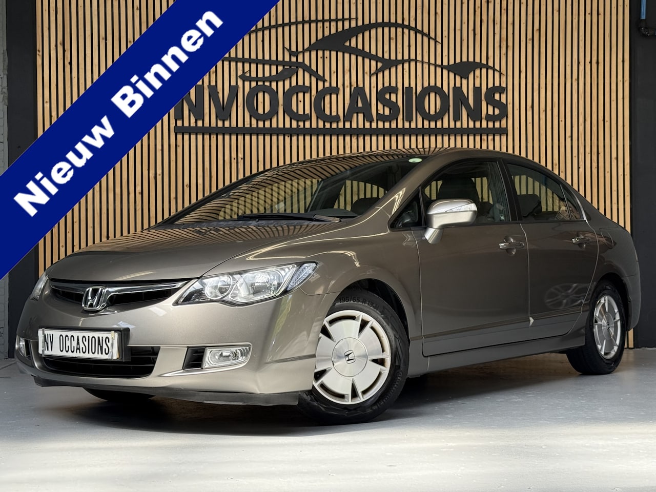Honda Civic - 1.3 Hybrid LEDER/PARKEERSENSR/STOELVW/CRUISE/NAP/ZUINIG! - AutoWereld.nl