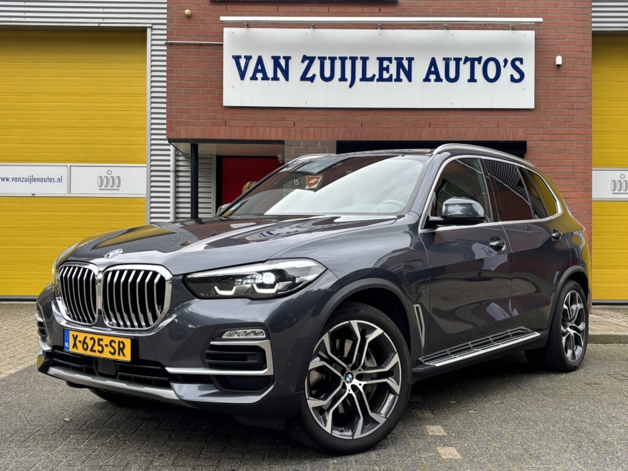BMW X5 - xDrive45e X-Line Luchtvering Camera ACC Memory 21" - AutoWereld.nl