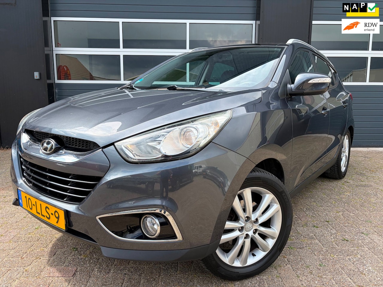 Hyundai ix35 - 2.0i|Pano|Airco|Cruise control|Nieuw APK - AutoWereld.nl