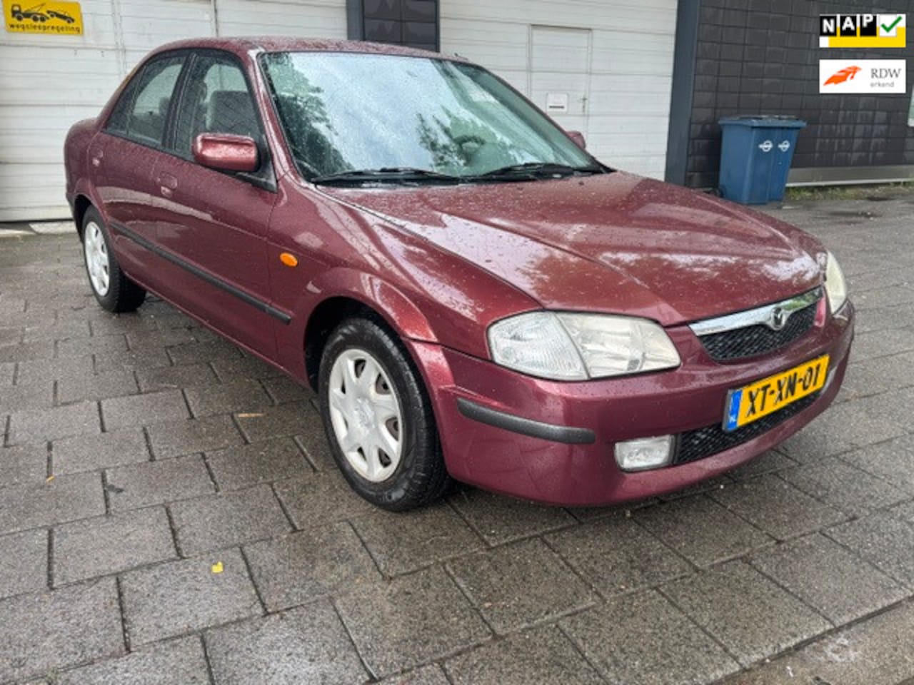 Mazda 323 - 1.5i GLX NAP AIRCO AUTOMAAT LAGE KM - AutoWereld.nl