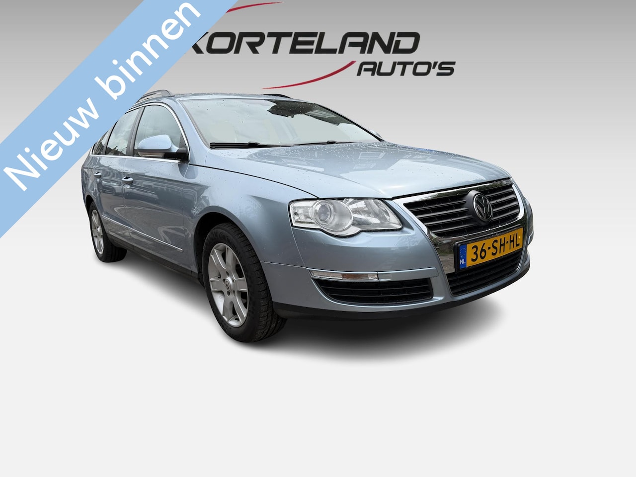 Volkswagen Passat Variant - 2.0 FSI Comfortline TREKHAAK - AutoWereld.nl