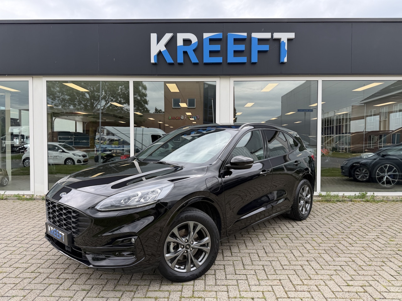 Ford Kuga - 2.5 PHEV ST-Line X ACC | Stoelverwarming - AutoWereld.nl