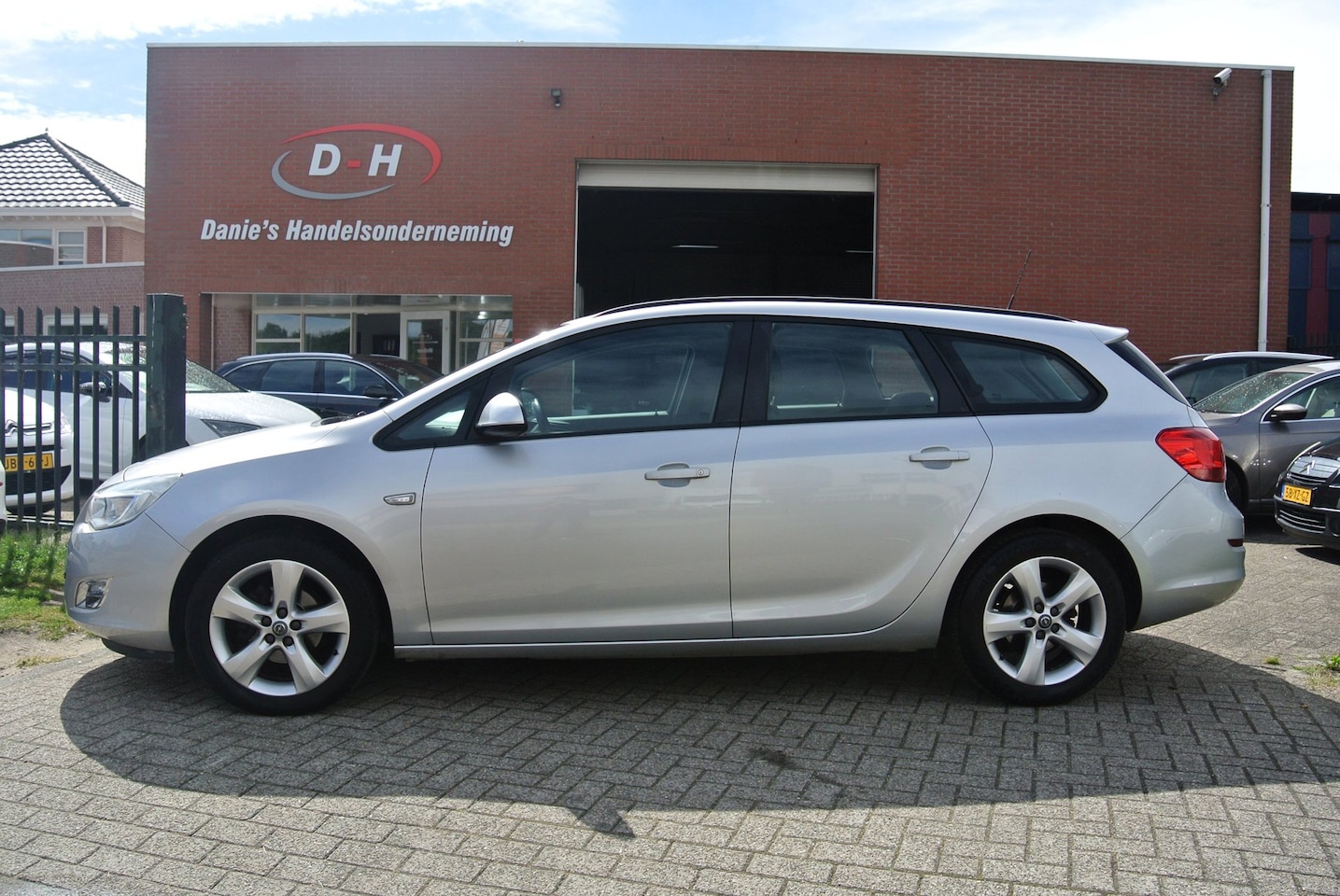 Opel Astra Sports Tourer - 1.4 Edition airco inruil mogelijk nap - AutoWereld.nl