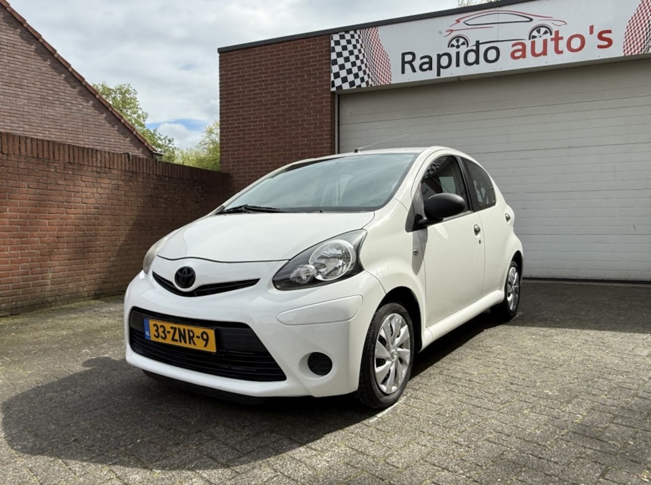 Toyota Aygo - 1.0 VVT-I COMF 77865 Km NAP 2013 Airco - AutoWereld.nl