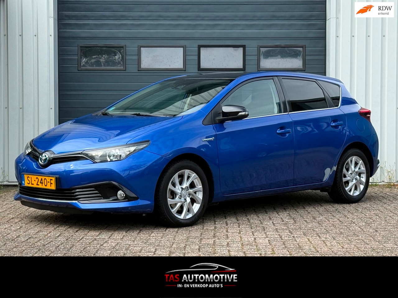 Toyota Auris - 1.8 Hybrid Comfort 2e EIG / NAVI / CRUISE - AutoWereld.nl