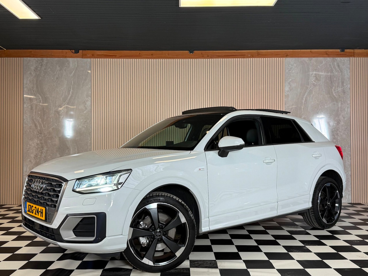Audi Q2 - 1.4 TFSI CoD Design Pro Line Plus 3xS-Line Pano Airco Cruise Control - AutoWereld.nl