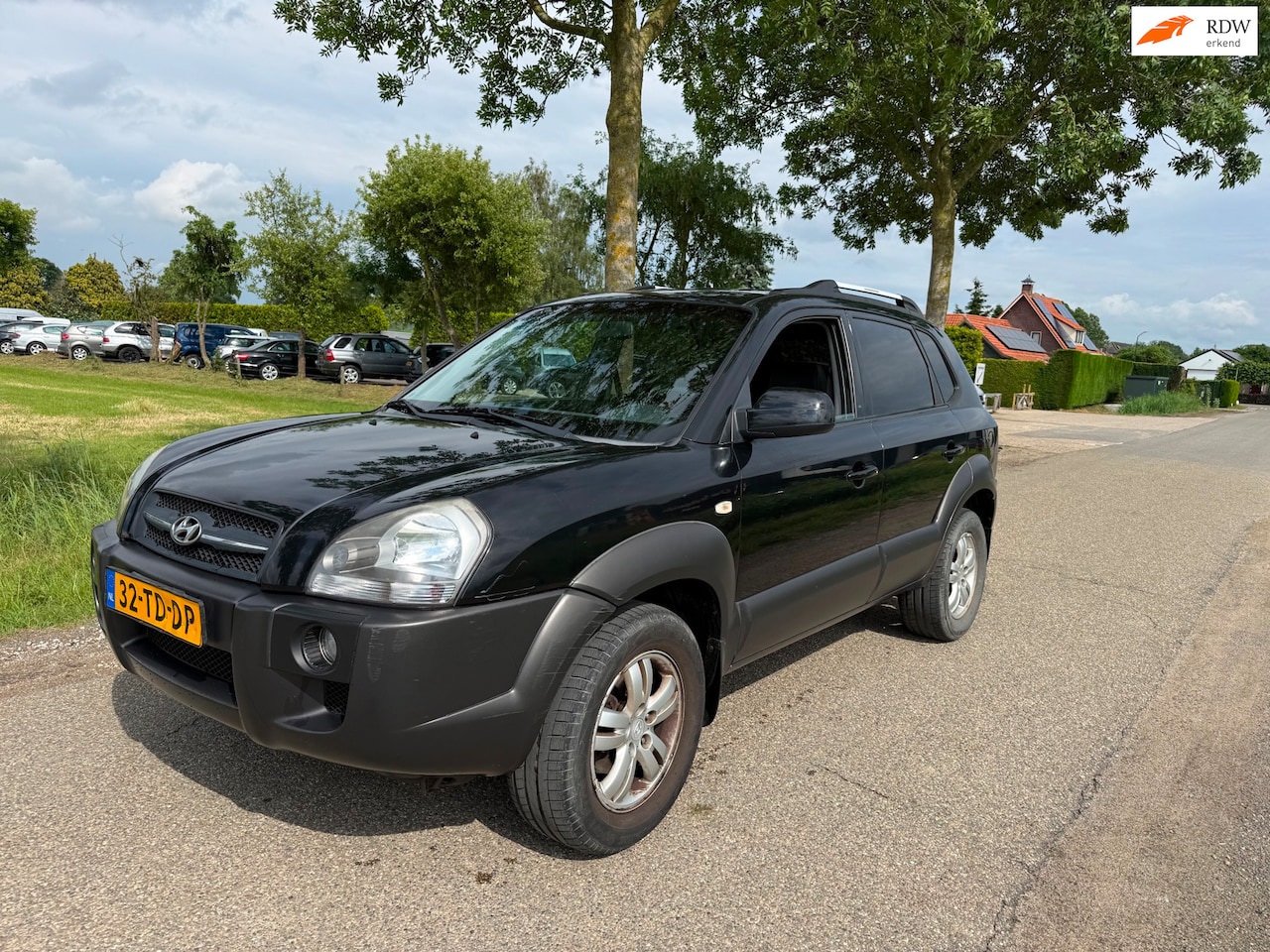 Hyundai Tucson - 2.0i Dynamic World Cup edition/Leder/ Export - AutoWereld.nl