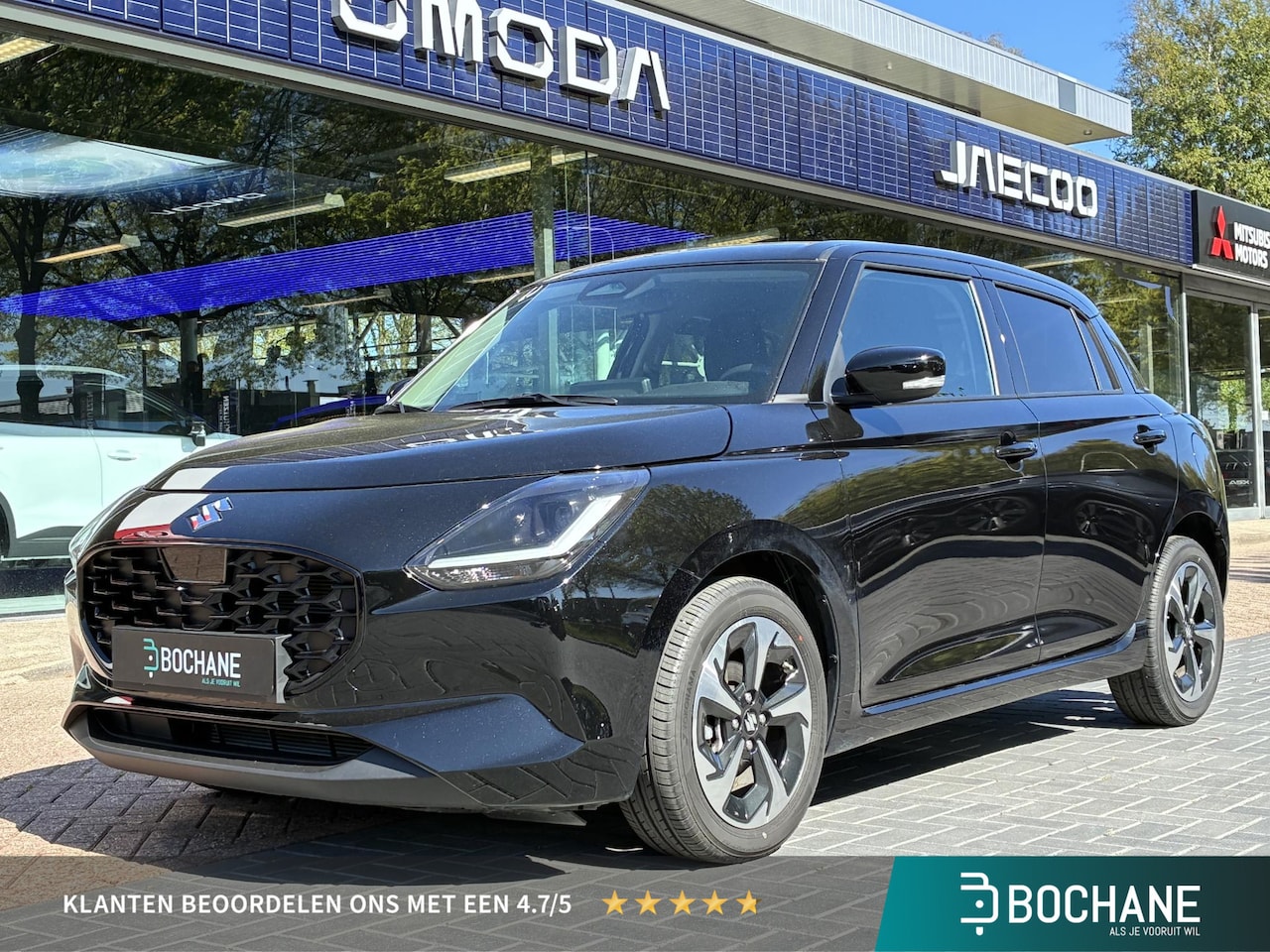 Suzuki Swift - 1.2 Style Smart Hybrid | Adaptive Cruise Control | Navigatie | Stoelverwarming | Achteruit - AutoWereld.nl