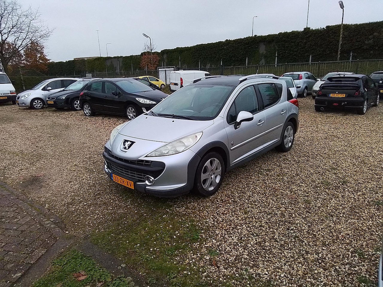 Peugeot 207 SW Outdoor - 1.6 VTi XS zeer lux,s airco trekhaak paneramadak radio cd - AutoWereld.nl