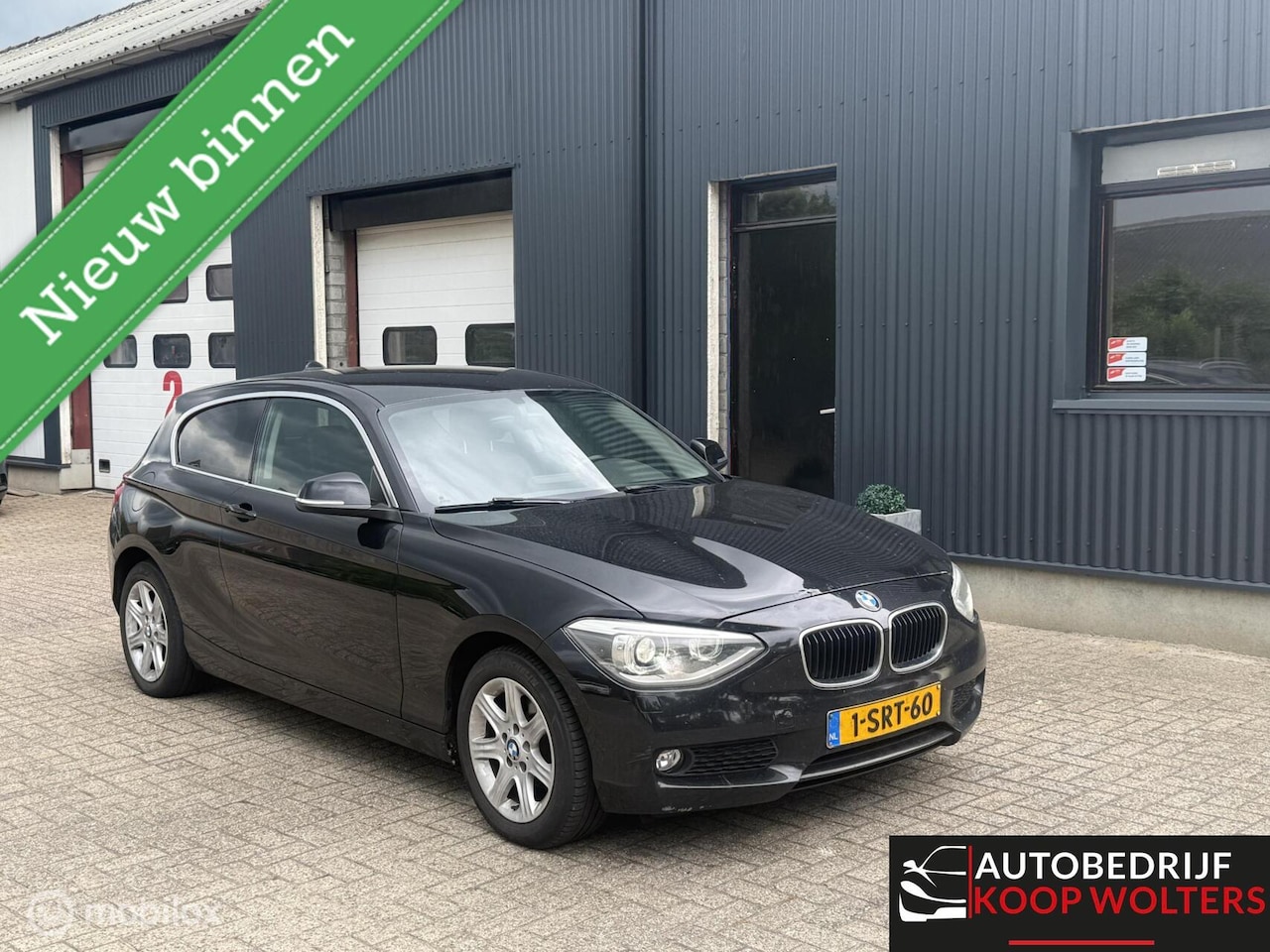 BMW 1-serie - 116d Executive Xenon Navigatie - AutoWereld.nl