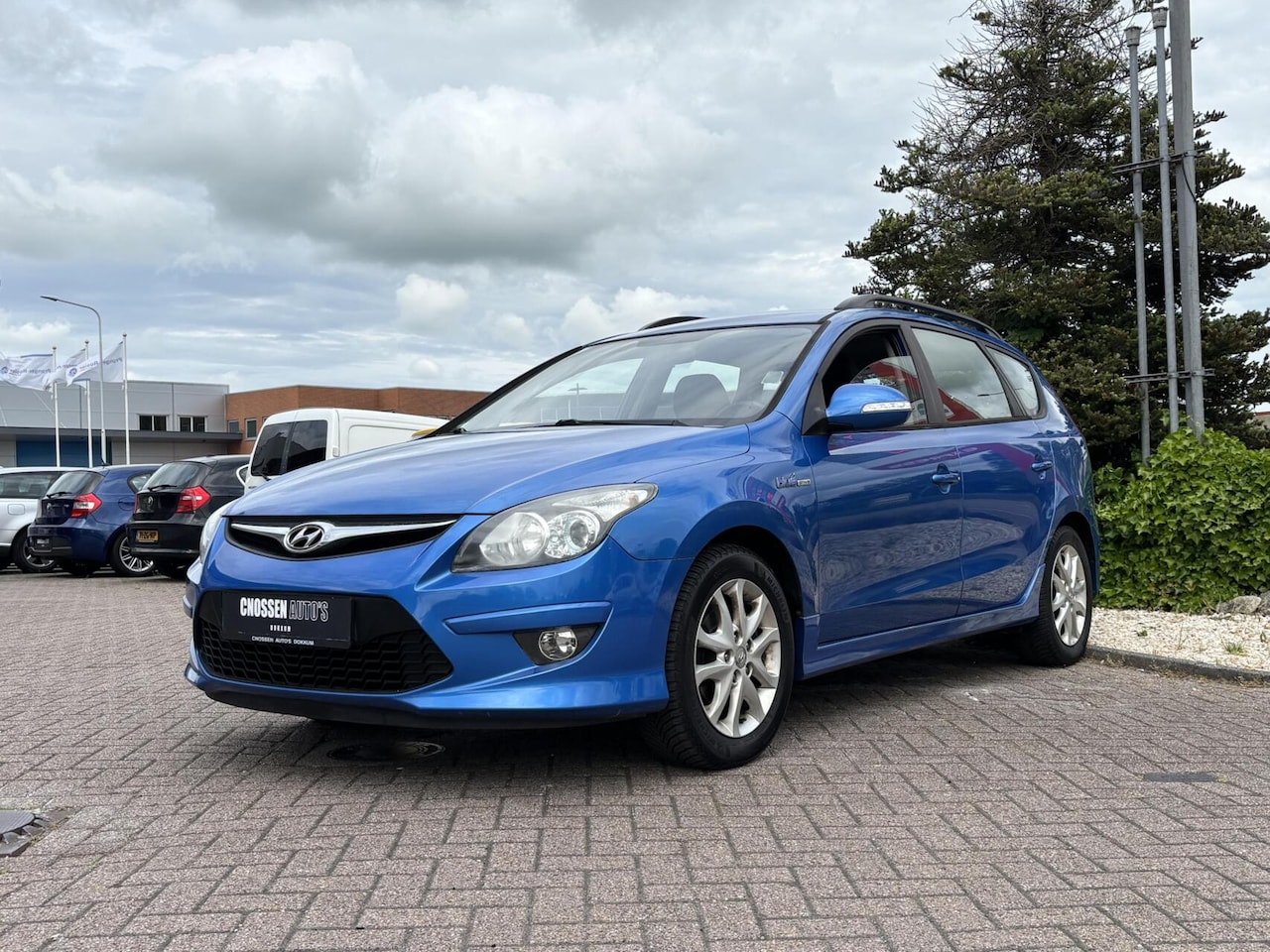 Hyundai i30 CW - 1.6i i-Motion 1.6i i-Motion, Bleu, Airco, Cruise, 1e eig! - AutoWereld.nl