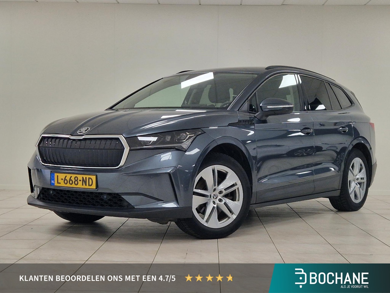 Skoda Enyaq iV - 60 First Edition ELEKTRISCH UITKLAPBARE TREKHAAK | SOH 93,7 % | NAVIGATIE | ACHTERUITRIJCA - AutoWereld.nl