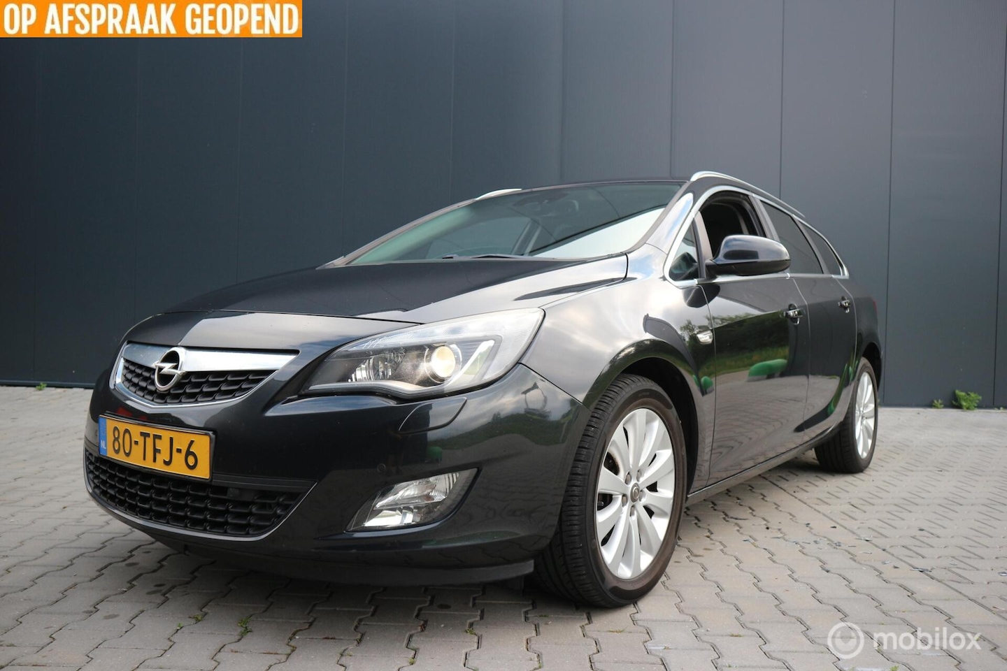 Opel Astra Sports Tourer - 1.3 CDTi S/S Cosmo XENON/2X-PDC/ECC - AutoWereld.nl
