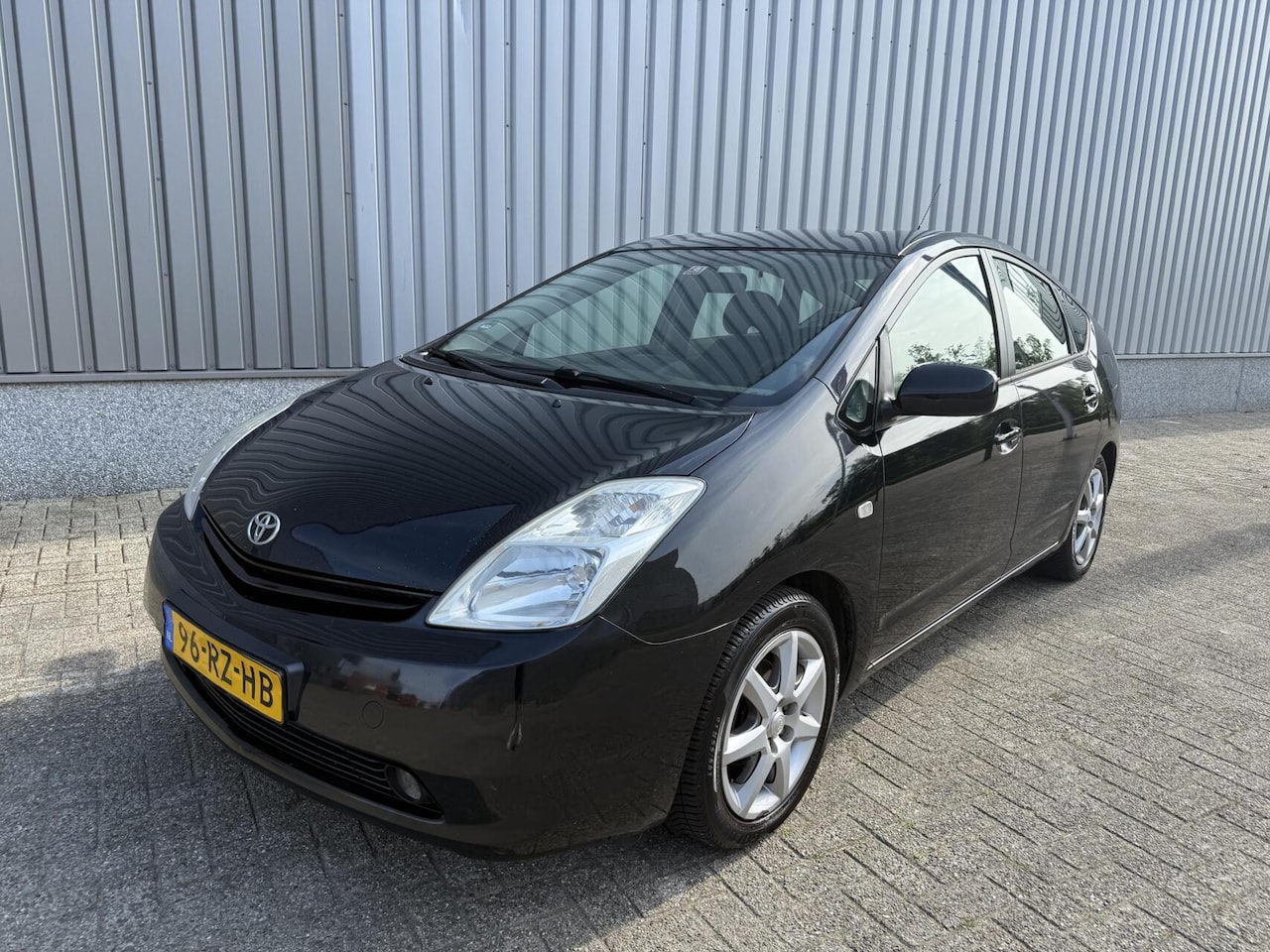 Toyota Prius - 1.5 VVT-i hybrid Airco - AutoWereld.nl