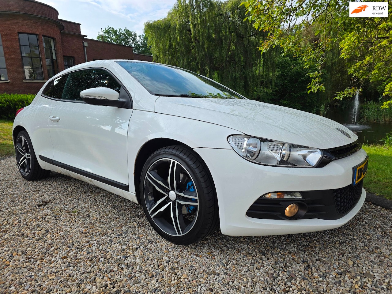Volkswagen Scirocco - 1.4 TSI Highline AIRCO *apk:02-2027* - AutoWereld.nl