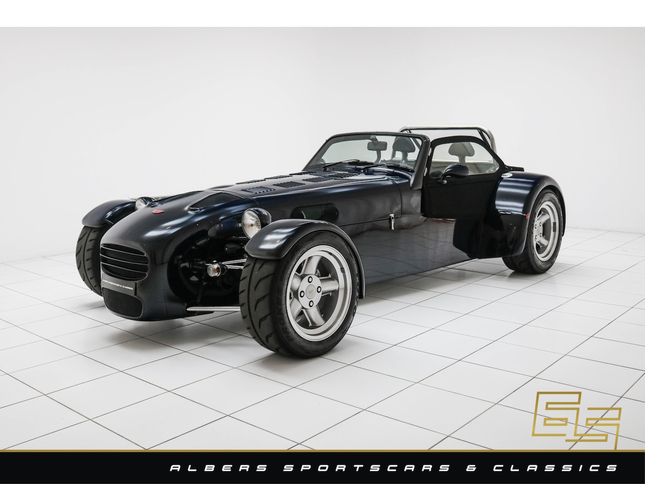 Donkervoort D8 - 1.8 Audi 235E Sport Wide Track 27k km - Carbon - All original - 2 owners - AutoWereld.nl
