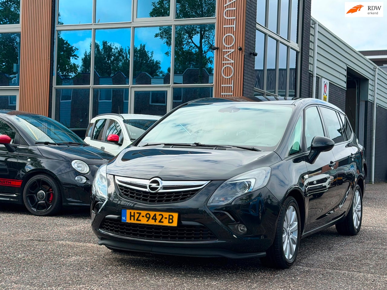 Opel Zafira Tourer - 1.4 Cosmo 7 PERSOONS - AIRCO - CARPLAY - LICHTMETALEN VELGEN - VAKANTIE KLAAR!!! - AutoWereld.nl