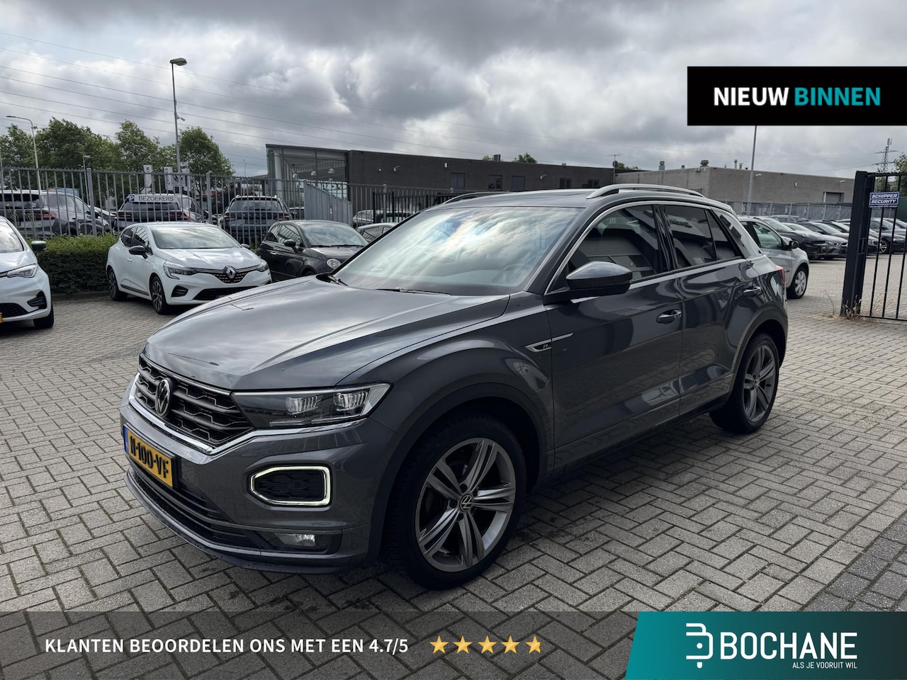Volkswagen T-Roc - 1.5 TSI Sport Business R | Navigatie | Carplay | Leer | Pano - AutoWereld.nl
