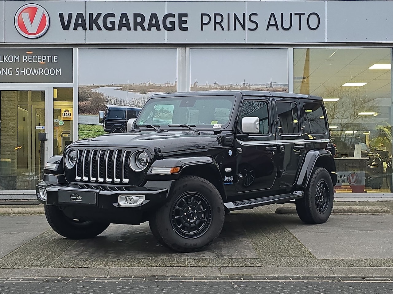 Jeep Wrangler Unlimited - 4xe 380 Sahara Irmscher | NO. 007/100 |858,- P/M|STUUR+STOELVERW.|CAMERA V+A|ALPINE AUDIO| - AutoWereld.nl