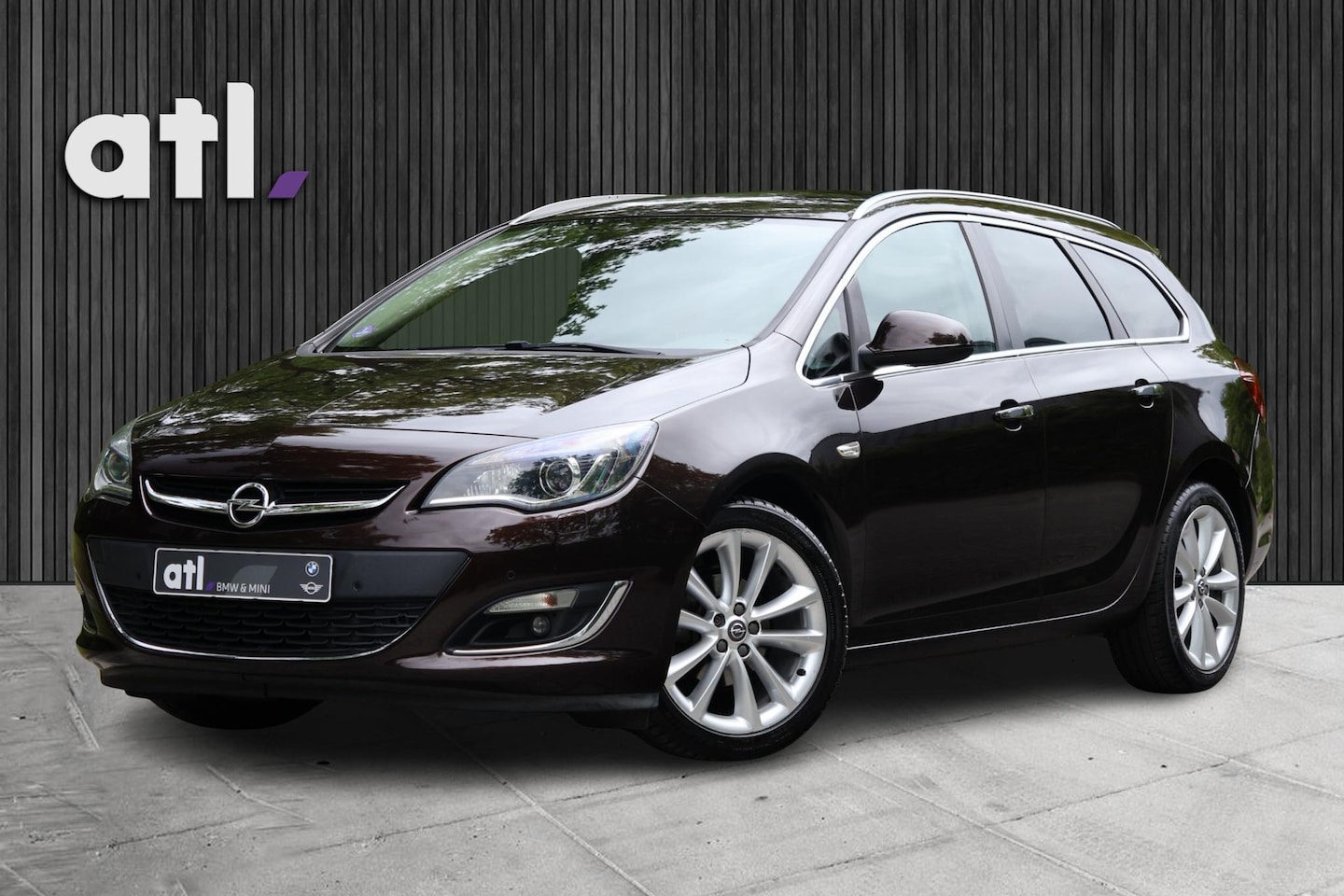 Opel Astra Sports Tourer - 1.4 Turbo Cosmo Navi | Stoelveerwarming | PDC v+a | Clima | Xenon | Trekhaak | 18" | BT | - AutoWereld.nl
