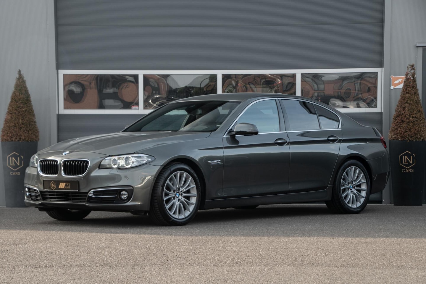 BMW 5-serie - 520i High Executive | HUD | Memory | Camera - AutoWereld.nl