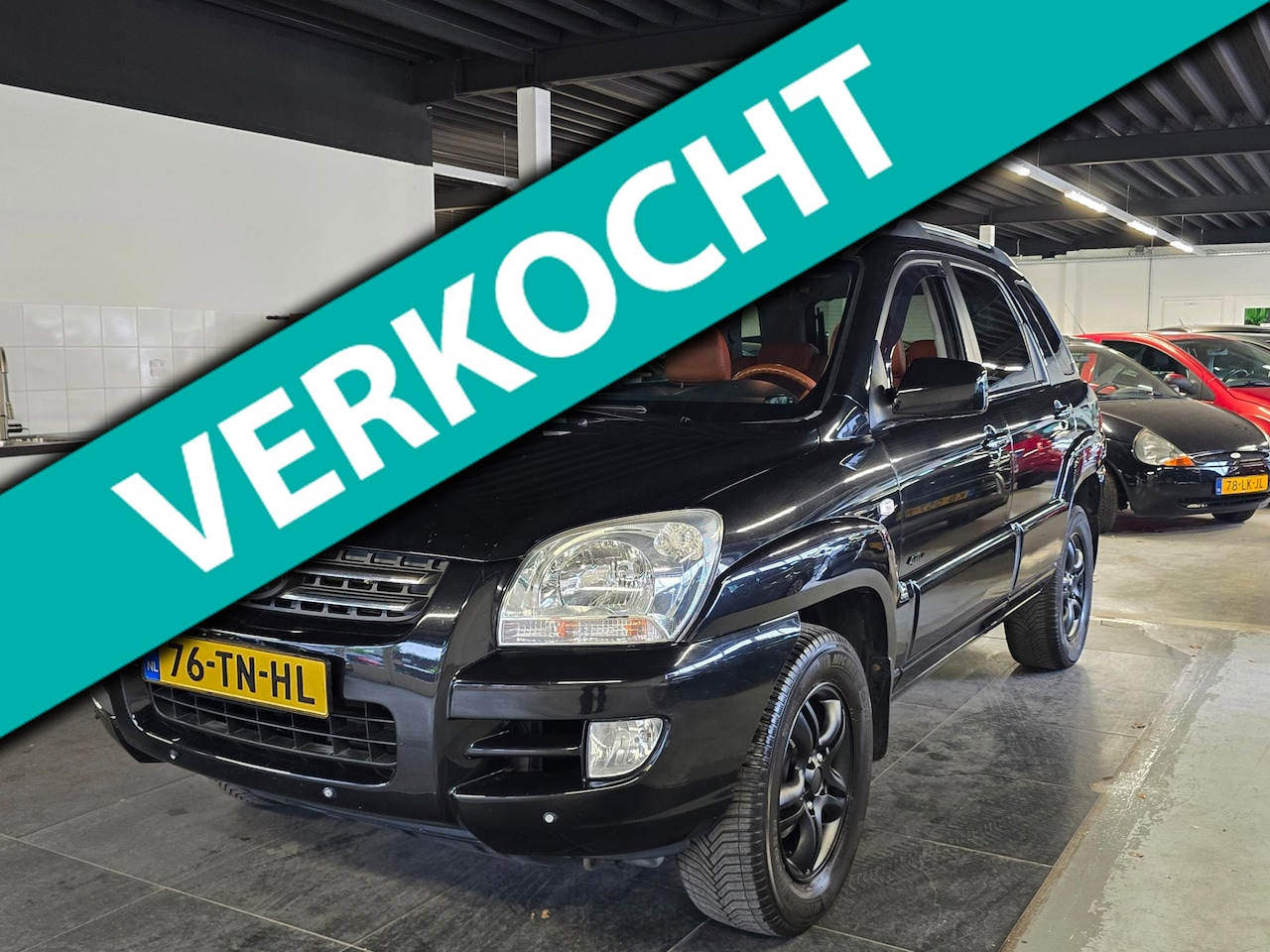Kia Sportage - 2.7 V6 M-bition 4WD/AUTOMAAT/CARPLAY/N.A.P/ - AutoWereld.nl