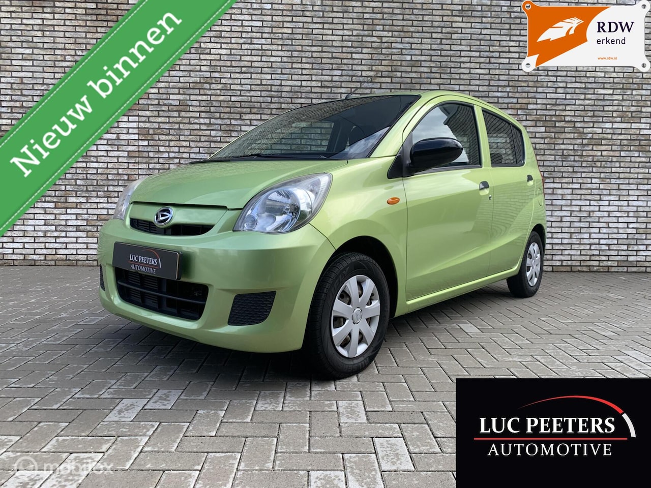 Daihatsu Cuore - 1.0 Trend 5DRS/NAP/STBK/ALLSEASON/111.291KM!! - AutoWereld.nl