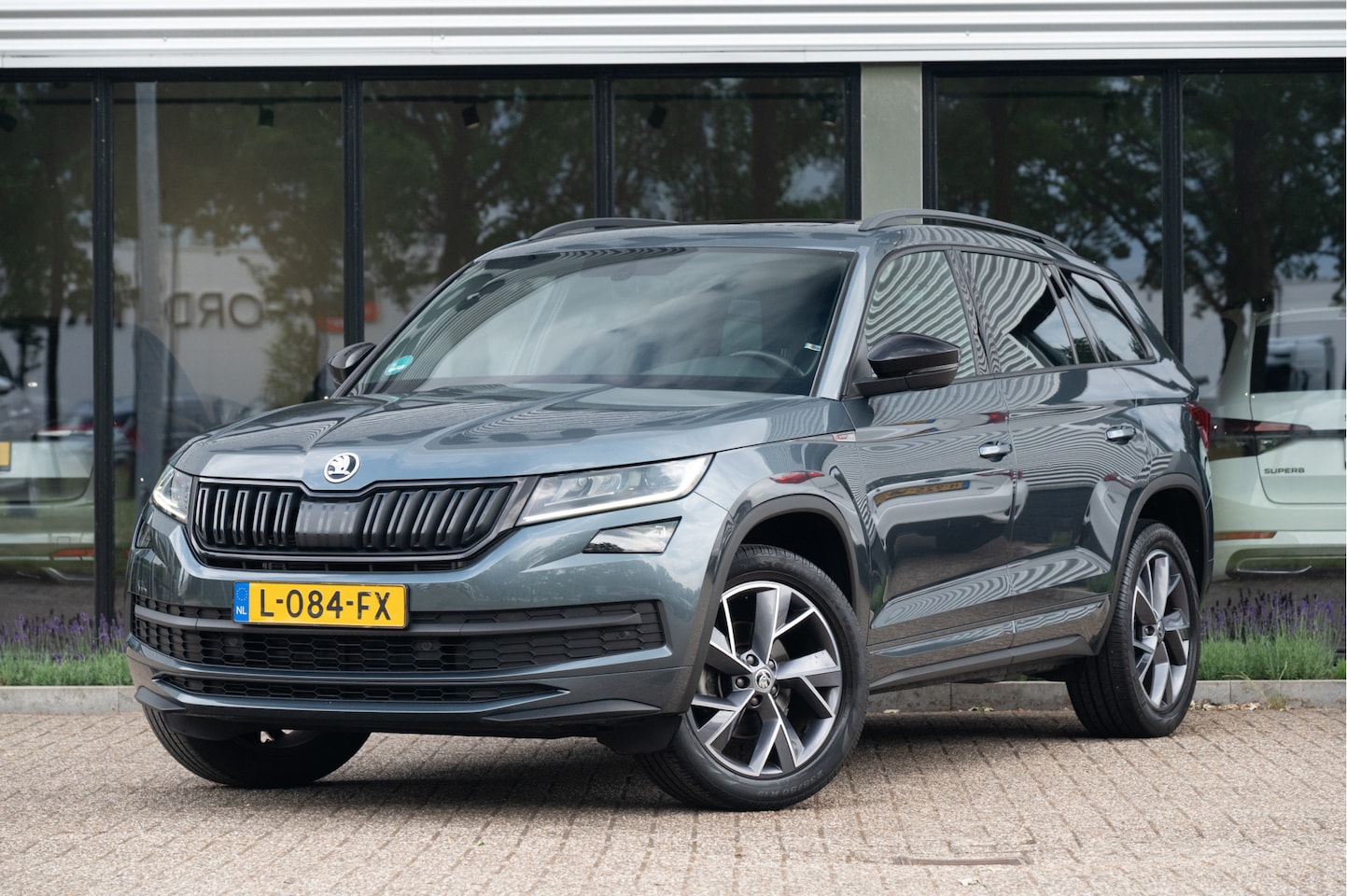 Skoda Kodiaq - 1.5 TSI Sportline Business | Pano | Trekhaak | Navi | Camera | Active Info | Elek. Best. S - AutoWereld.nl