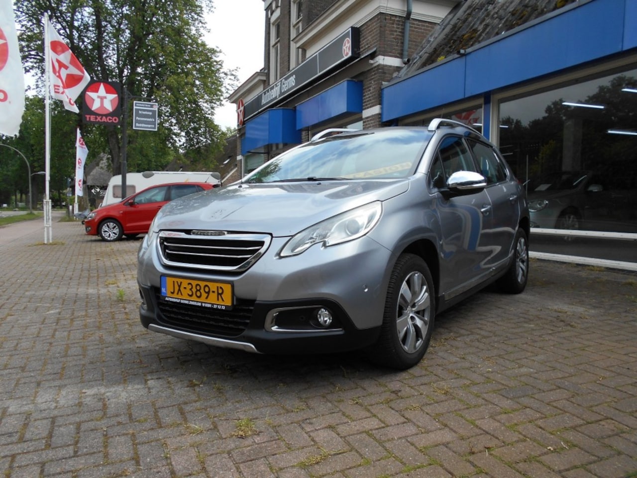 Peugeot 2008 - 1.2i 110PK Automaat Pure Tech Allure - AutoWereld.nl
