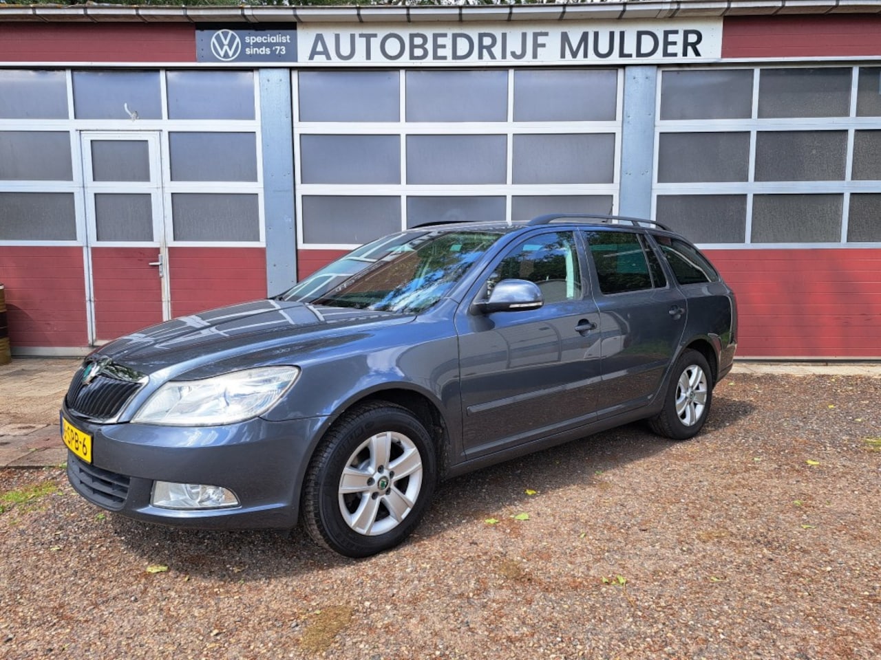 Skoda Octavia Combi - 1.6 TDI Greentech Ambition Business Line Combi 1.6 TDI 105 Pk Greentech Ambition Business Line ECC PDC NAV - AutoWereld.nl
