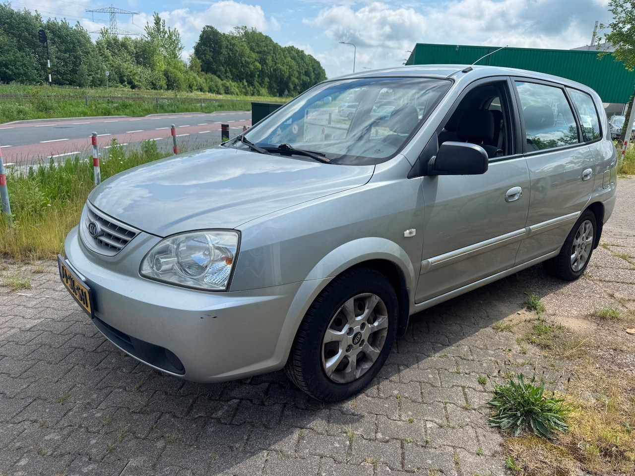 Kia Carens - 2.0 CVVT M-bition 2.0 CVVT M-bition - AutoWereld.nl