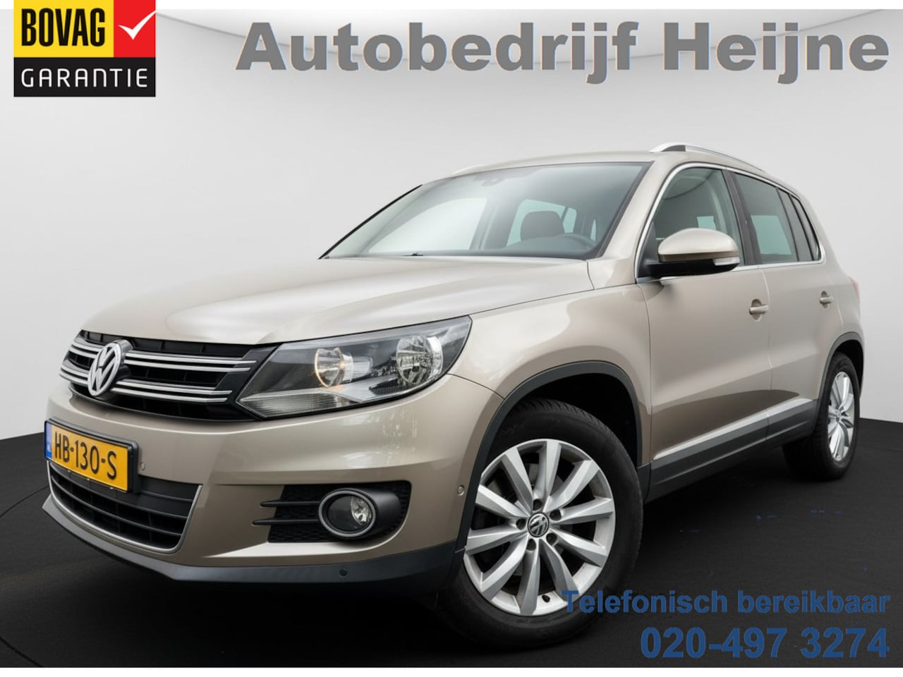 Volkswagen Tiguan - 1.4 TSI 123PK SPORT&STYLE TREKHAAK/PDC/NAVIGATIE - AutoWereld.nl