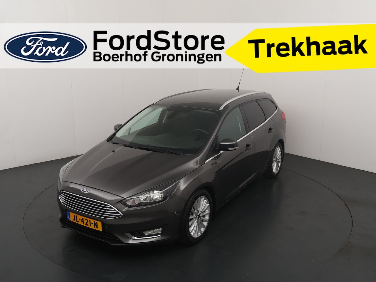 Ford Focus Wagon - EcoBoost 125 pk Titanium | Trekhaak | Voorruitverw. | Navi | Clima | Cruise | 17" | Keyles - AutoWereld.nl