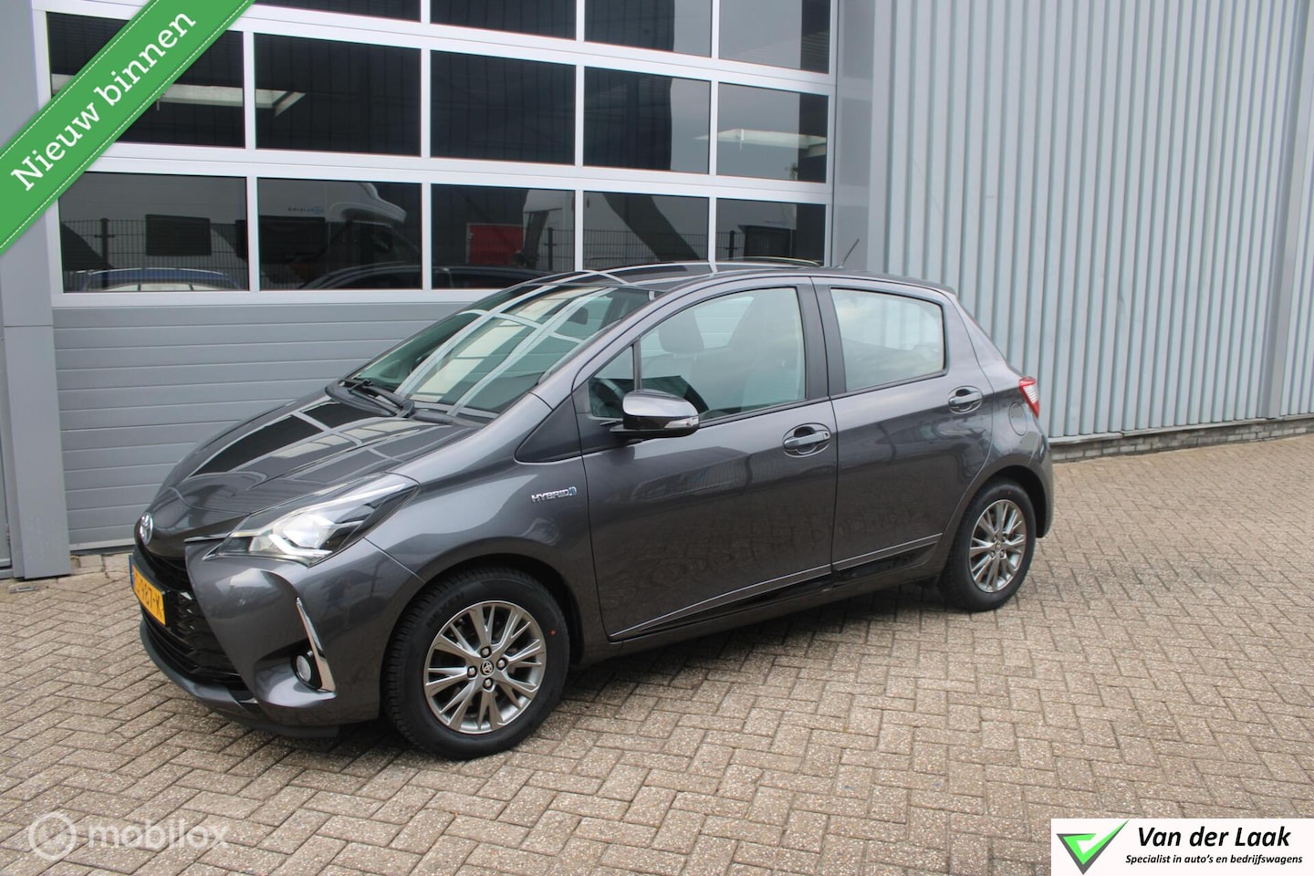 Toyota Yaris - 1.5 Hybrid Design | Trekhaak | Sportvelgen | Navigatie | NL Auto Boekjes. - AutoWereld.nl