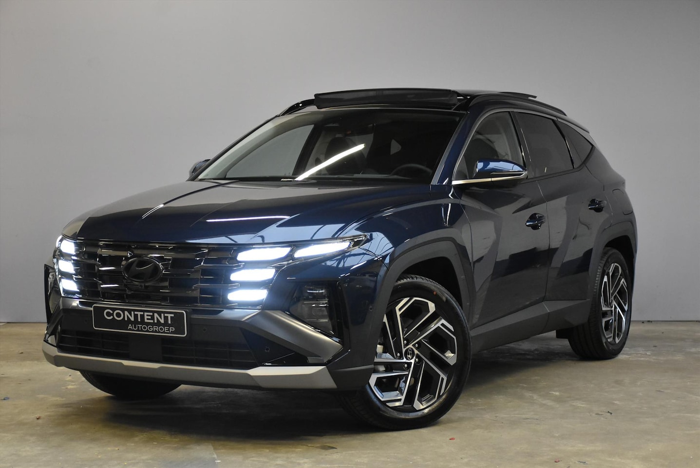 Hyundai Tucson - 1.6 T-GDi HEV 238pk 2WD Aut Premium Sky I Voorraadvoordeel ! - AutoWereld.nl