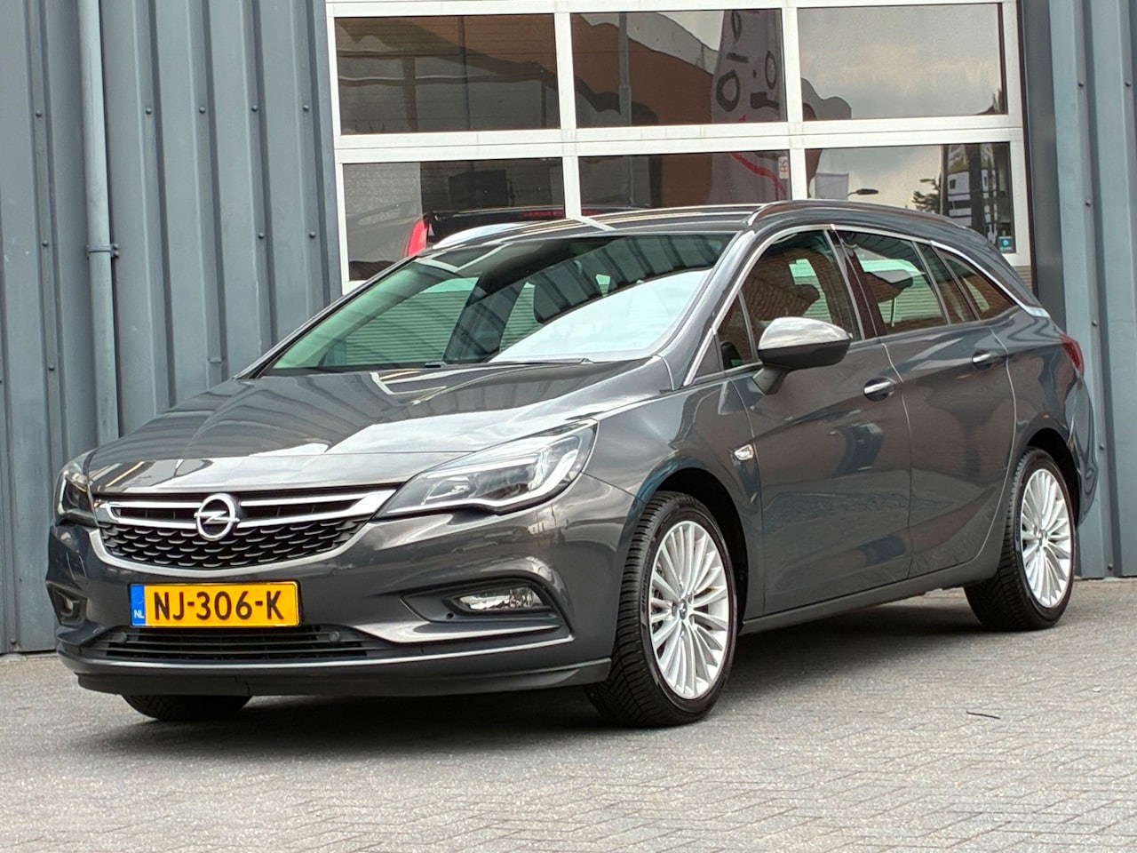 Opel Astra Sports Tourer - 1.4 Innovation Automaat Navigatie Trekhaak Clima Cruise controle - AutoWereld.nl