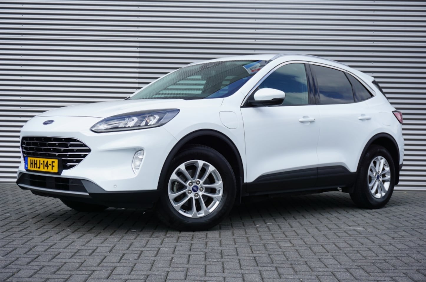 Ford Kuga - 225PK PHEV Titanium AUTOM. | CAMERA | AFN. TREKHAAK | NAVI - AutoWereld.nl