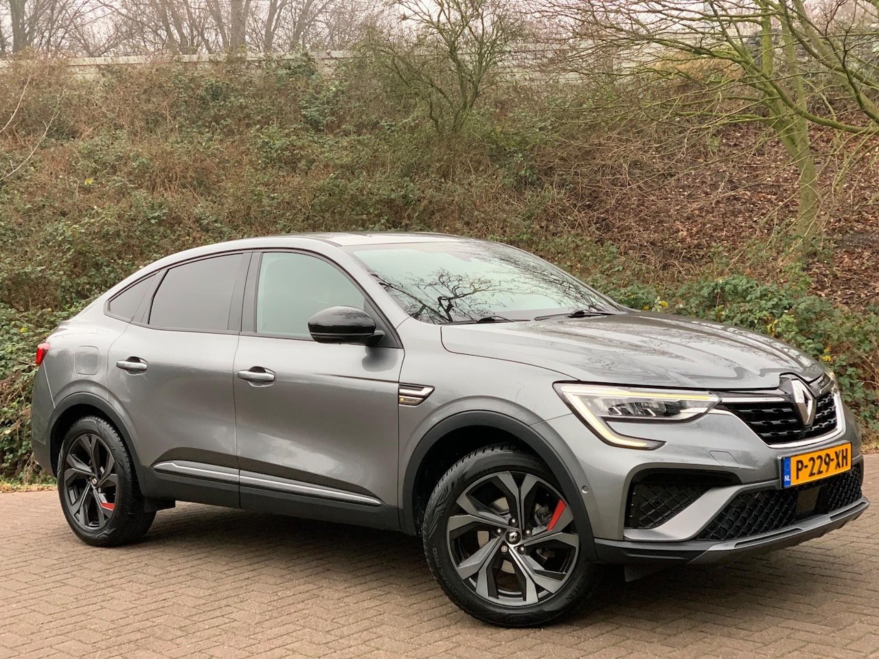 Renault Arkana - 1.6 E-Tech Hybrid 145 R.S. Line NIEUWSTAAT FULL OPTION ! - AutoWereld.nl
